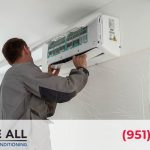 Technician performing mini split repair efficiently