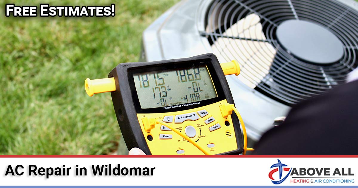 Technician performing AC repair service in Wildomar, CA