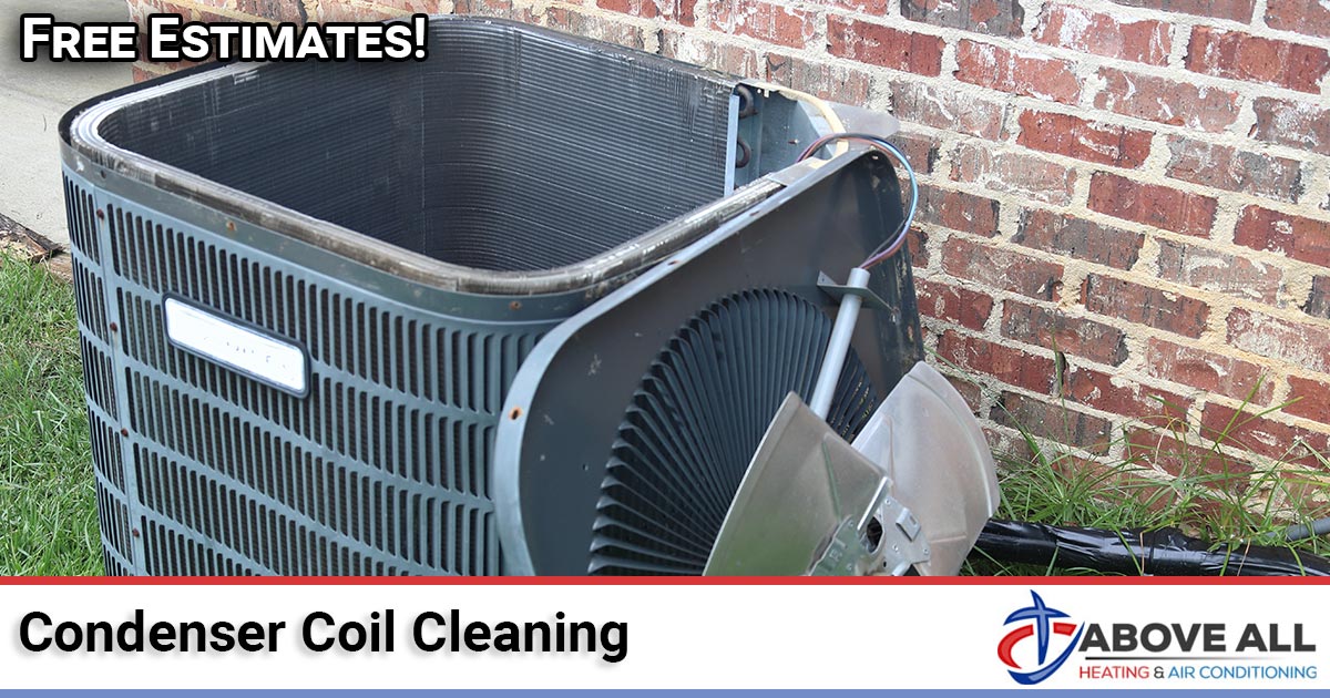 Condenser Coil Cleaning Technician cleaning a dirty outdoor AC condenser coil to restore airflow and efficiency