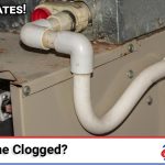 Above All Heating and Air technician clearing a clogged AC condensate drain line at a Southern California home