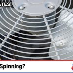 Above All Heating and Air technician checking an outdoor AC condenser fan that is not spinning