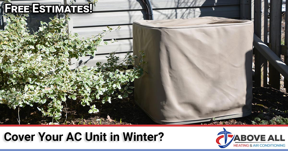Air conditioner cover on an outdoor AC unit, from Above All Heating and Air's guide to protecting your AC in winter
