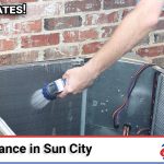 Above All Heating and Air technician performing AC maintenance for a home in Sun City, Menifee, CA